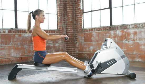 exercising on rowing machine